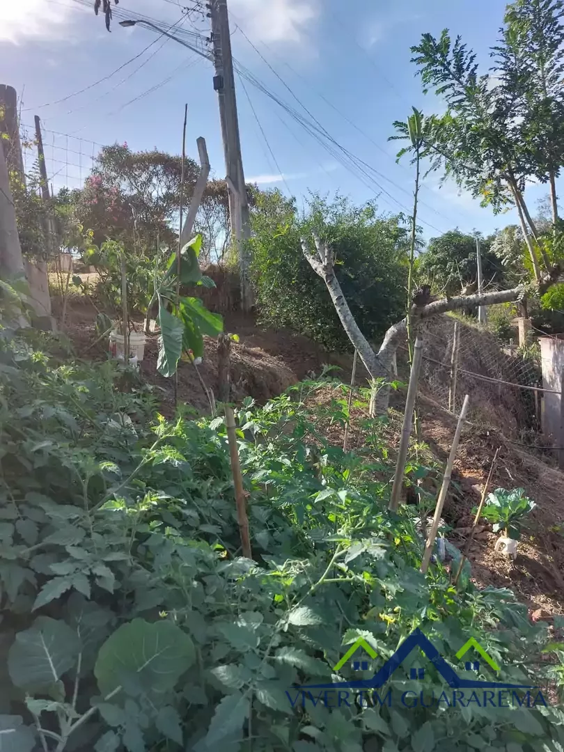 TERRENO COM PEQUENA CASA SEMI-PRONTA — Miniatura 2